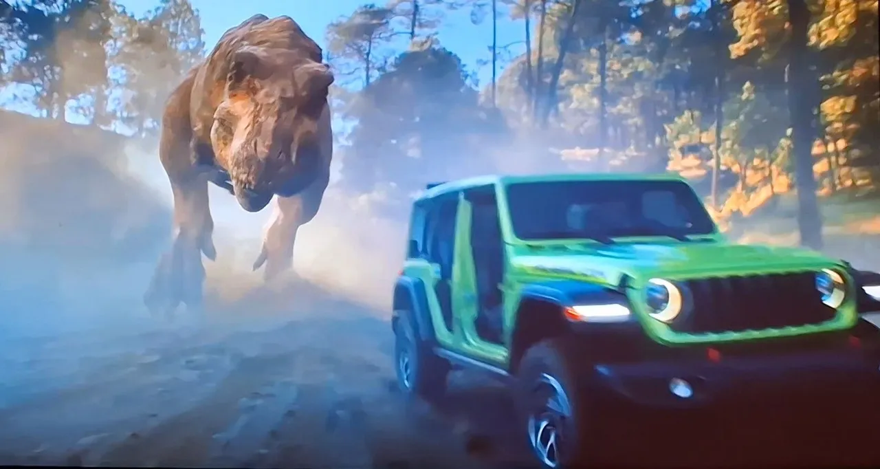 Adegan Jeep Wrangler Rubicon 4xe berwarna Mojito saat dikejar T-Rex di kampanye 'Jurassic Trail Rated'. (Chadie)