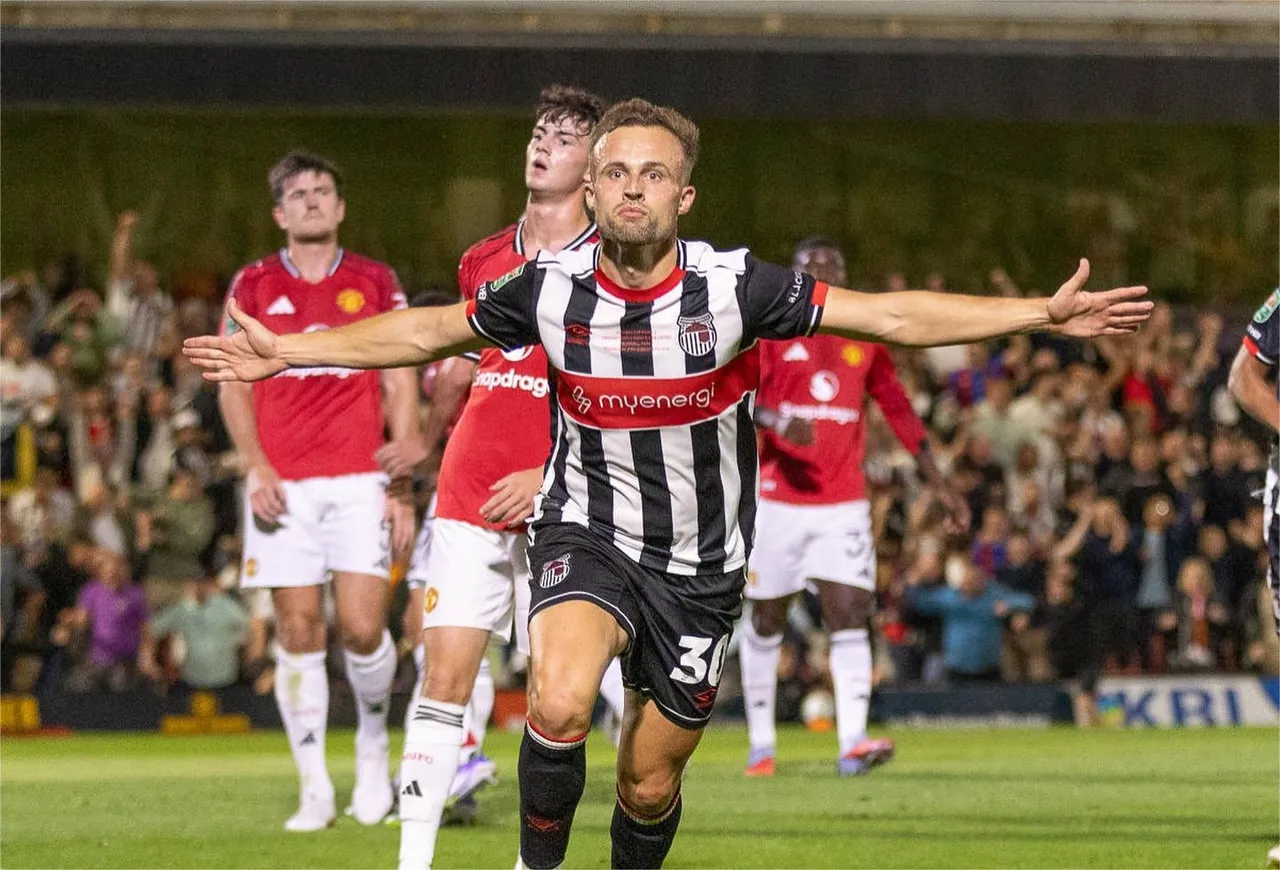 Pertandingan antara Grimsby Town vs Manchester United