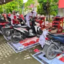 Llayanan servis sepeda motor gratis dari AHM untuk para korban banjir bandang Sumatra. (AHM)