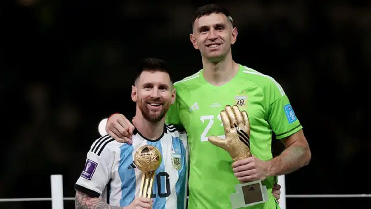 Emiliano Martinez dan Lionel Messi